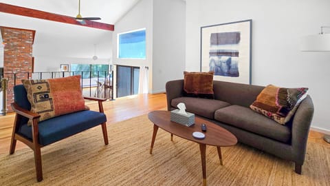 Living room is open to first floor below