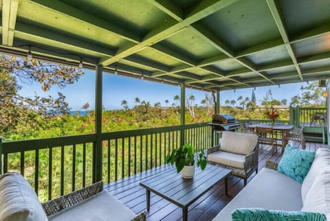 Sit back and relax on the spacious covered lanai, the perfect spot to sip your morning coffee while soaking in tropical breezes and lush views.