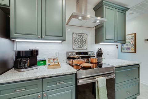 Over-range hood has fan and extra lighting to make cooking easy
