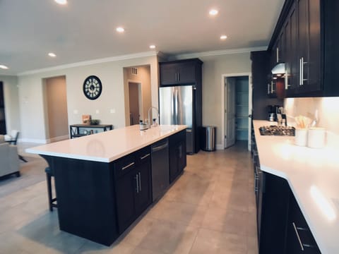 Beautiful, open kitchen layout, well stocked for cooking and serving for 6