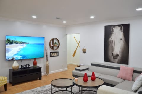 Living Room with 75 inch 4k smart TV.
