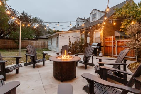 Enjoy a relaxing evening under the lights by the fire pit!
