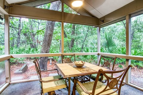 comfortable screened porch overlooking the private wooded view