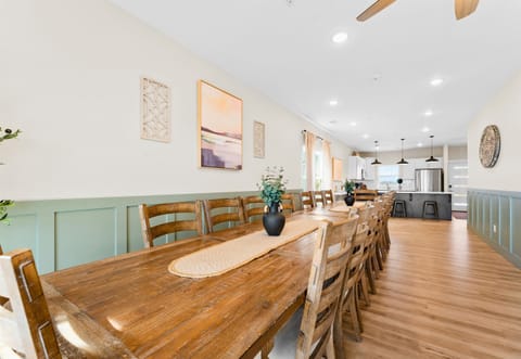 This large dining table is perfect for gathering with family and friends, whether it’s for a casual meal or a celebration.