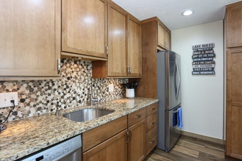 Kitchen with fridge/freezer/ice maker and dishwasher