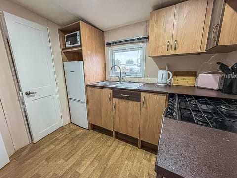 Cozy kitchen with modern appliances and natural light