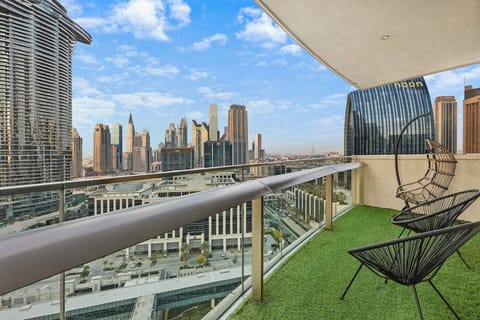 Balcony Escape: Stunning skyline views from your private terrace! Perfect for sunset sips.