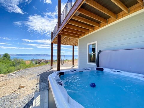 Relax in the hot tub with stunning lake views and mountain air all around you.