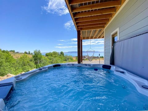 Relax in the hot tub with stunning views and fresh mountain air all around you.