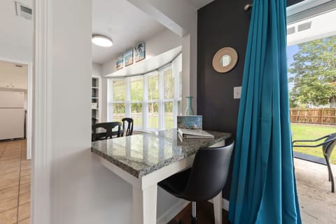 Designated Desk Space - This designated desk space, helps your relax with a bright open window to look outside and enjoy the sunshine from within.