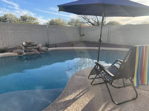 Enoy a cup of coffee in the early morning sun by the pool 