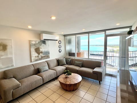 Spacious living room with ocean views.