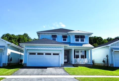 House front, double drive way and front porch
