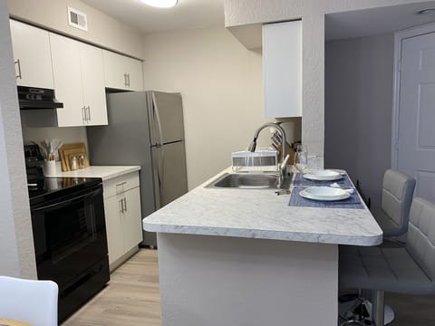 This unit has a charming newly updated kitchen.