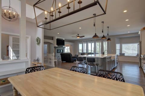 Adjacent dining table to the large kitchen 