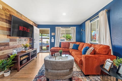 🌟📺 Lounge in Style 📺🌟 Kick back on the comfy sofa 🛋️, binge Netflix 🎬, and enjoy the perfect blend of color, comfort, and modern charm 💛🏡