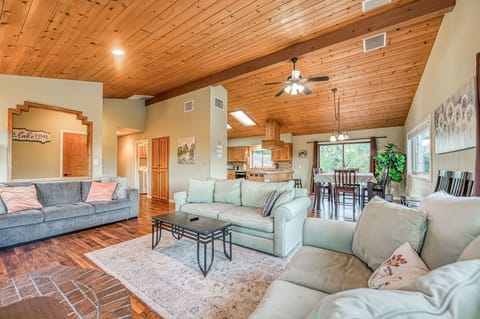 view of living room to dining room and kitchen