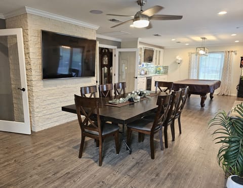 Watch the entertainment at the bar /pool table. 