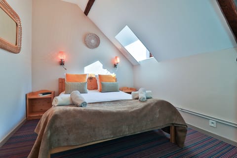 Relax on the comfy bed after a day outside.