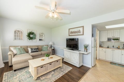 Bright coastal-inspired living room, creating the perfect place to unwind after the beach.