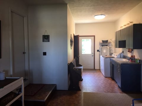 Drop zone breezeway with 2nd fridgerator, washer/dryer and 1/4 bathroom