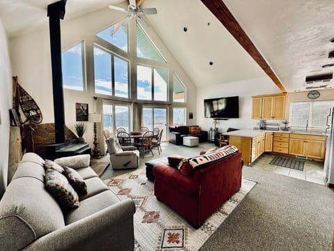 Grand room with huge view window and deck access