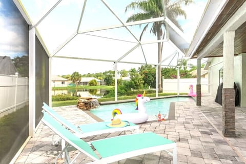 Relax poolside with your favorite beverage