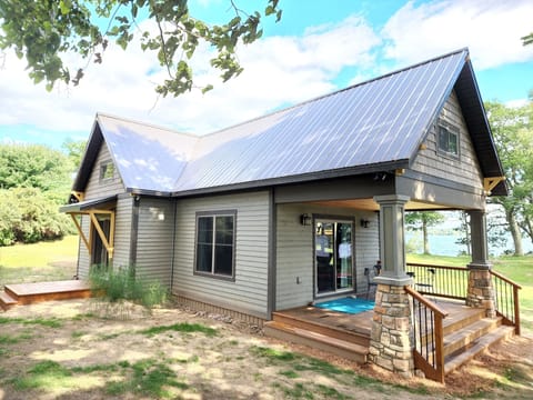 Craftsman style cottage with large porch.