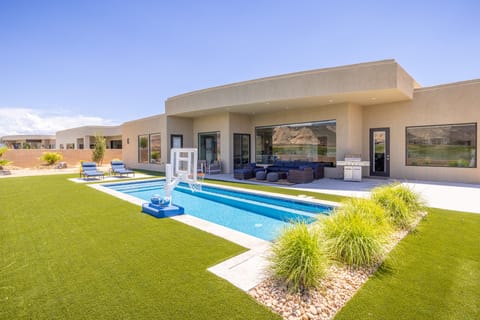 Back yard view of pool - View of the fun amenities available for you when you are a guest at our home.