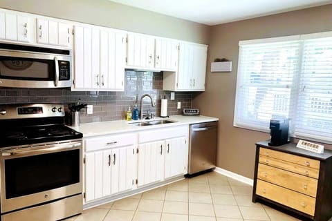 Electric range/oven, dishwasher and coffee station. (coffee included)