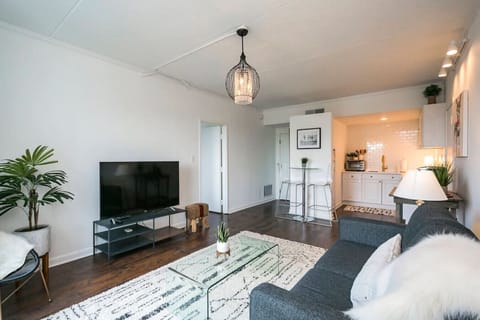 Cozy living room with a pullout couch. Smart TV with all the apps you could want. Queen air mattress also available. Plenty of seating plus a couple board games!