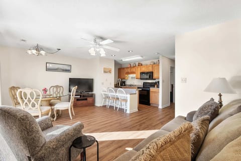 Bar Area with Three Stools for Additional Seating for Meals