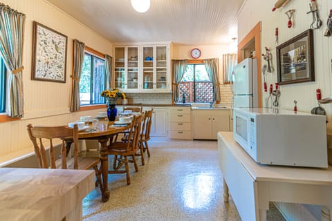 view of kitchen table that can seat 6