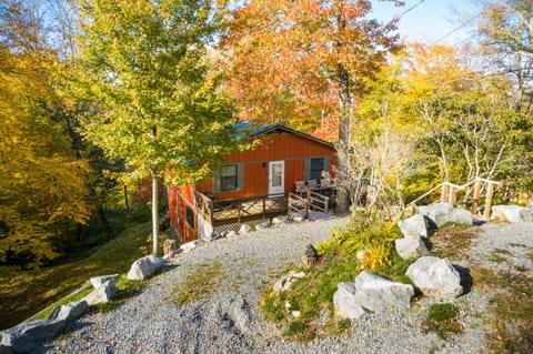 Circular gravel driveway offers plenty of room for parking. 