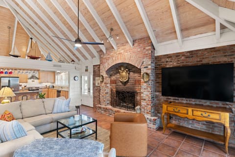 Den with gas fireplace.