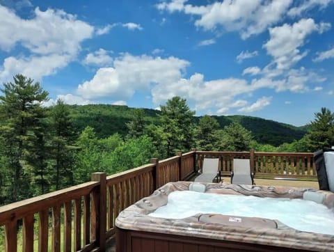 Private Hot Tub with view of the mountains and stars.