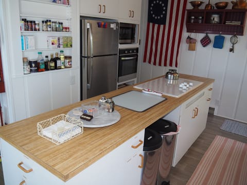 KITCHEN:  Large and full kitchen with a kitchen island and all appliances.