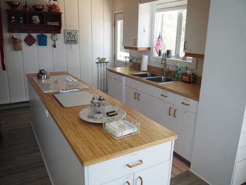 KITCHEN:  Large and full kitchen with a kitchen island and all appliances.
