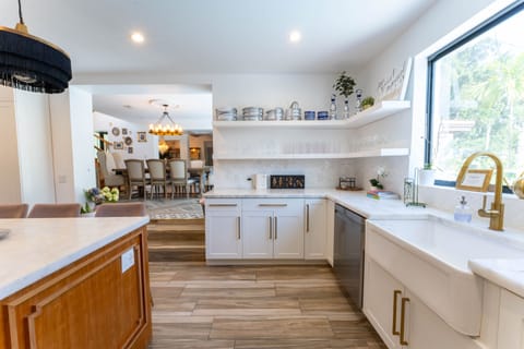 Dining connection flows into dining area with open shelves
