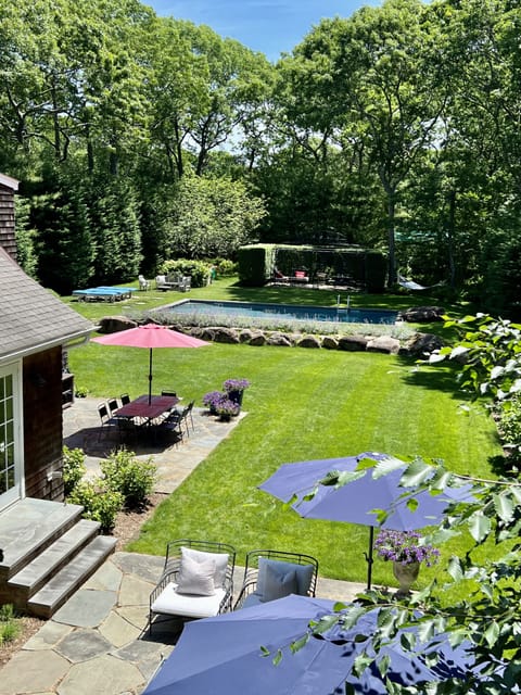 Lush property with multiple patios and heated pool 