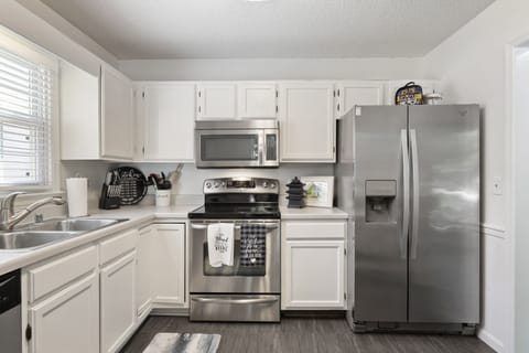 Kitchen with pots & pans and many tools