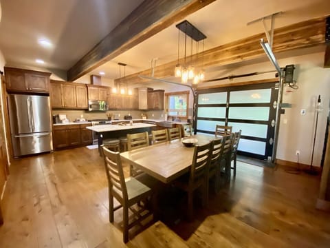 Dining with garage door that opens to the patio area 