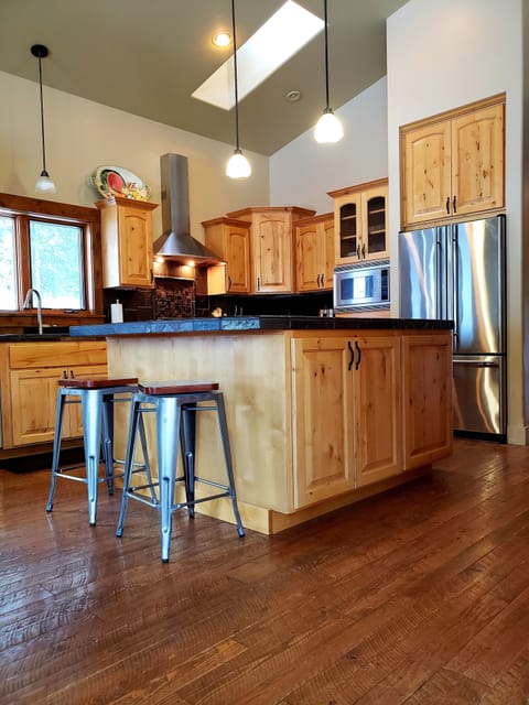 Stocked with appliances and cookware.