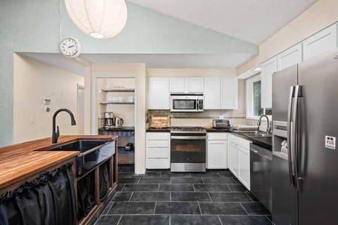 The kitchen is spacious and efficient. Perfect place to prepare a family meal.