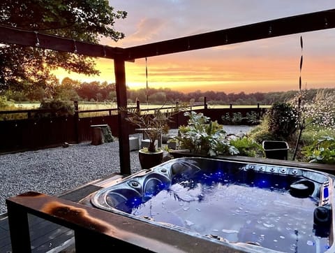 Overlooking open field onto Leigh Woods nature reserve