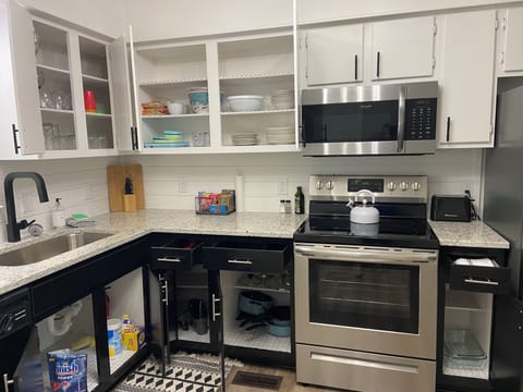 Inside cabinet view: Kitchen stocked and ready to make a family meal!