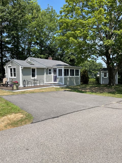 Front of home with two car driveway.