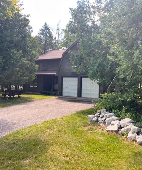 The suite is located above the garage doors with its own entrance outside 