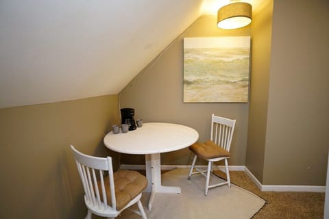 Table for games, puzzles, or morning coffee on the landing for the second floor