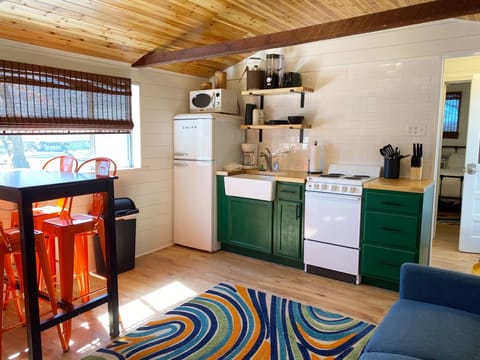 The dining table seats 4 guests.